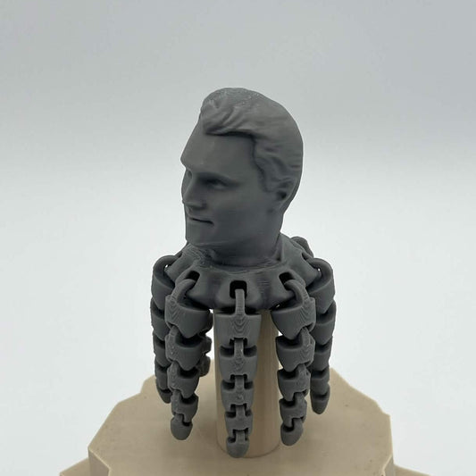 Heady Prints 3D printed gray Kirktopus articulated octopus figure, staged view