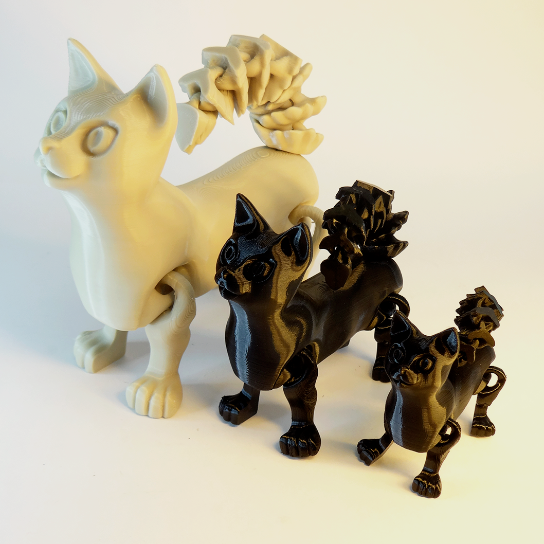 Heady Prints 3D printed multicolor cat figurines, group shot