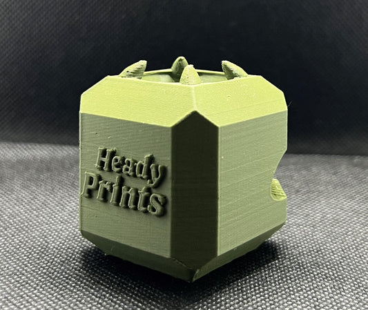 Heady Prints 3D printed green heady cube, label close-up