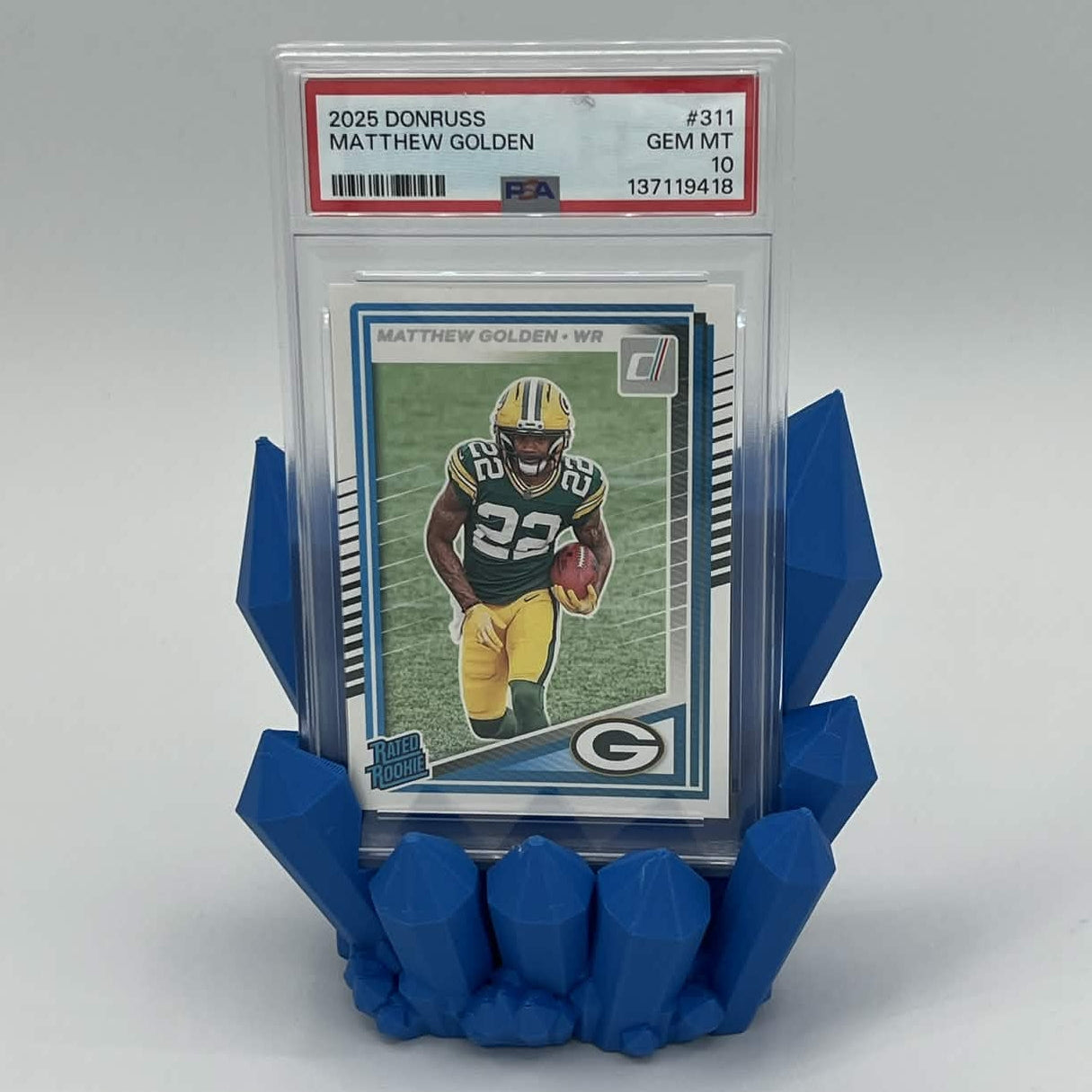 Heady Prints 3D printed blue Crystal PSA Slab Holder, staged front view with graded card