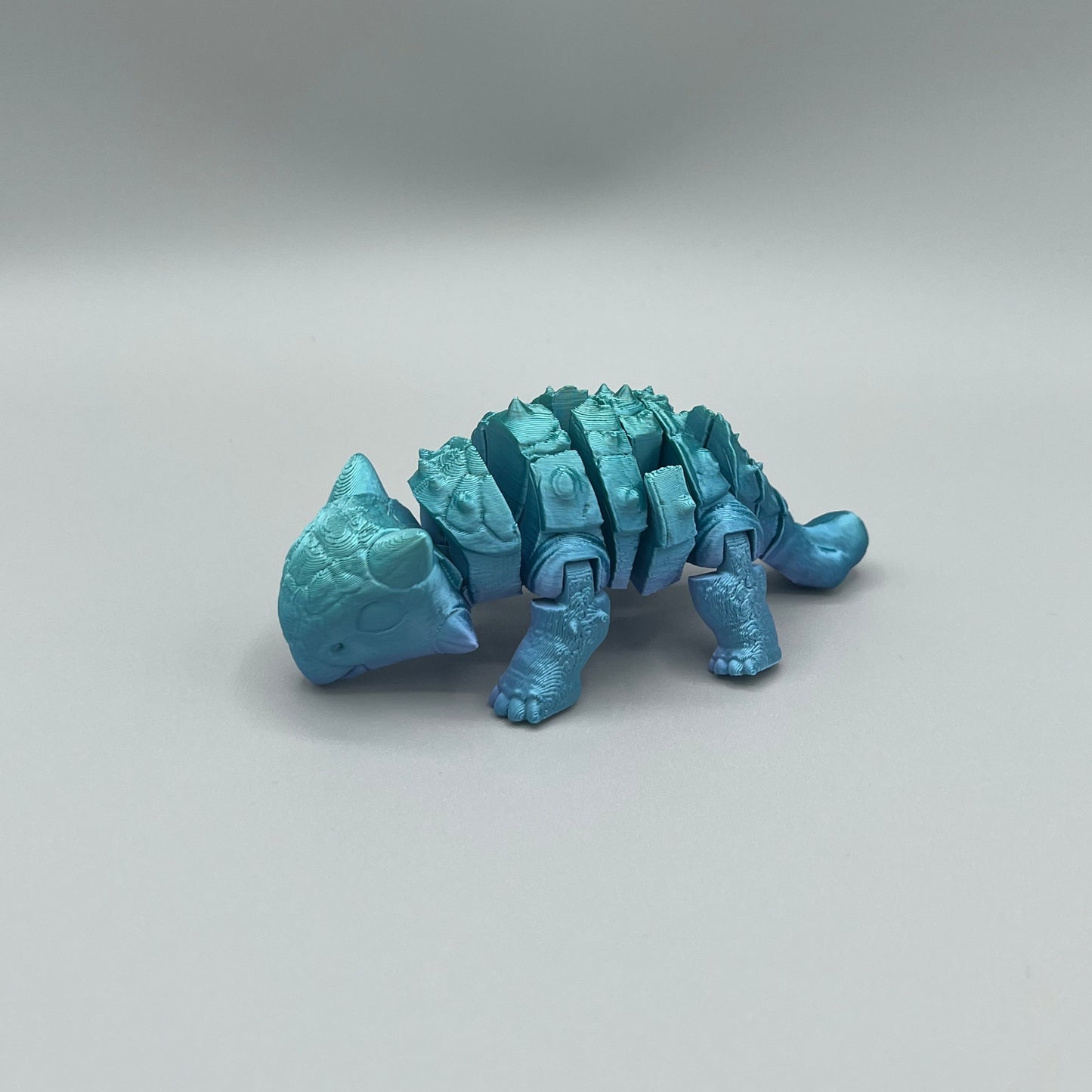Heady Prints 3D printed blue articulated ankylosaurus, promo