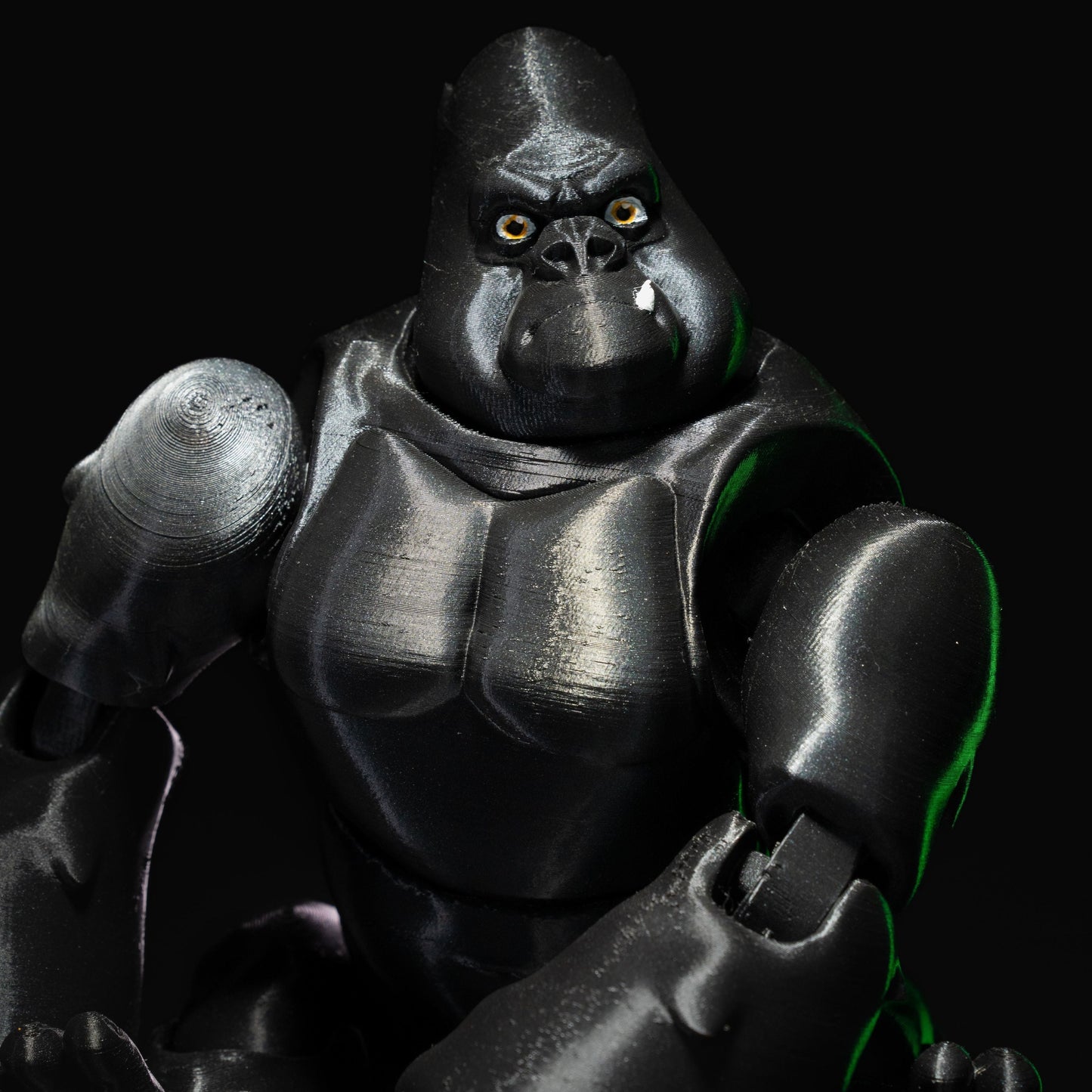 Heady Prints 3D printed black articulated gorilla, close up