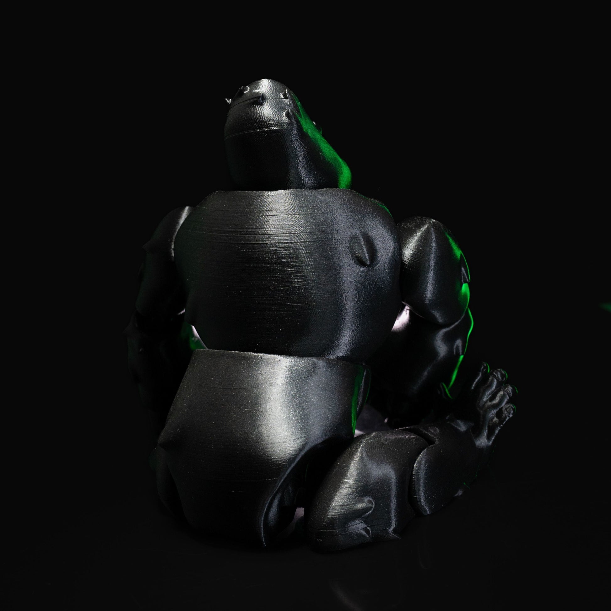 Heady Prints 3D printed black articulated gorilla, side view