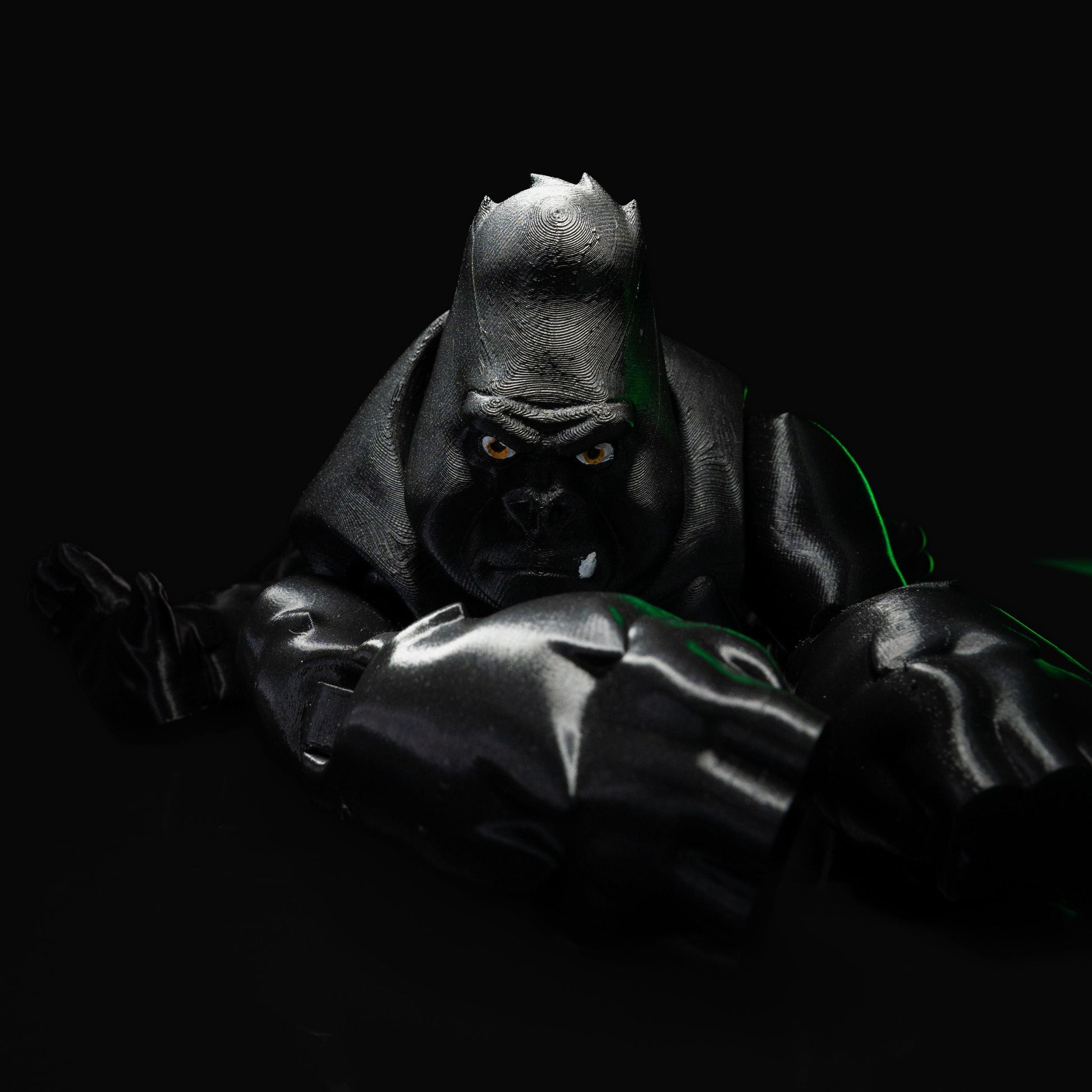 Heady Prints 3D printed black articulated gorilla, three quarter view