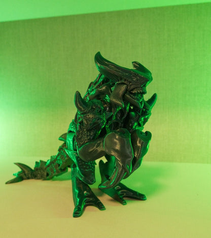 Heady Prints 3D printed green articulated kaiju monster figurine, angled view