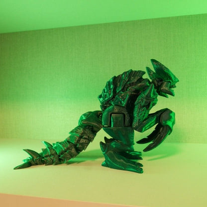 Heady Prints 3D printed green articulated kaiju monster figurine, front view