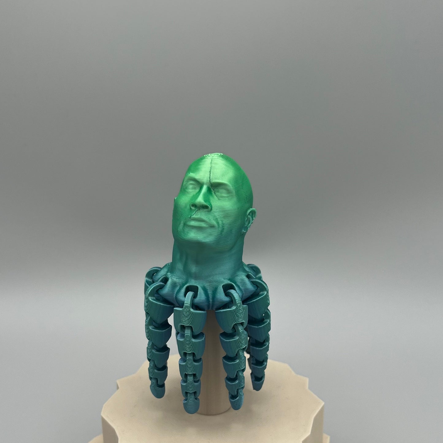 Heady Prints 3D printed multicolor articulated rocktopus, side view