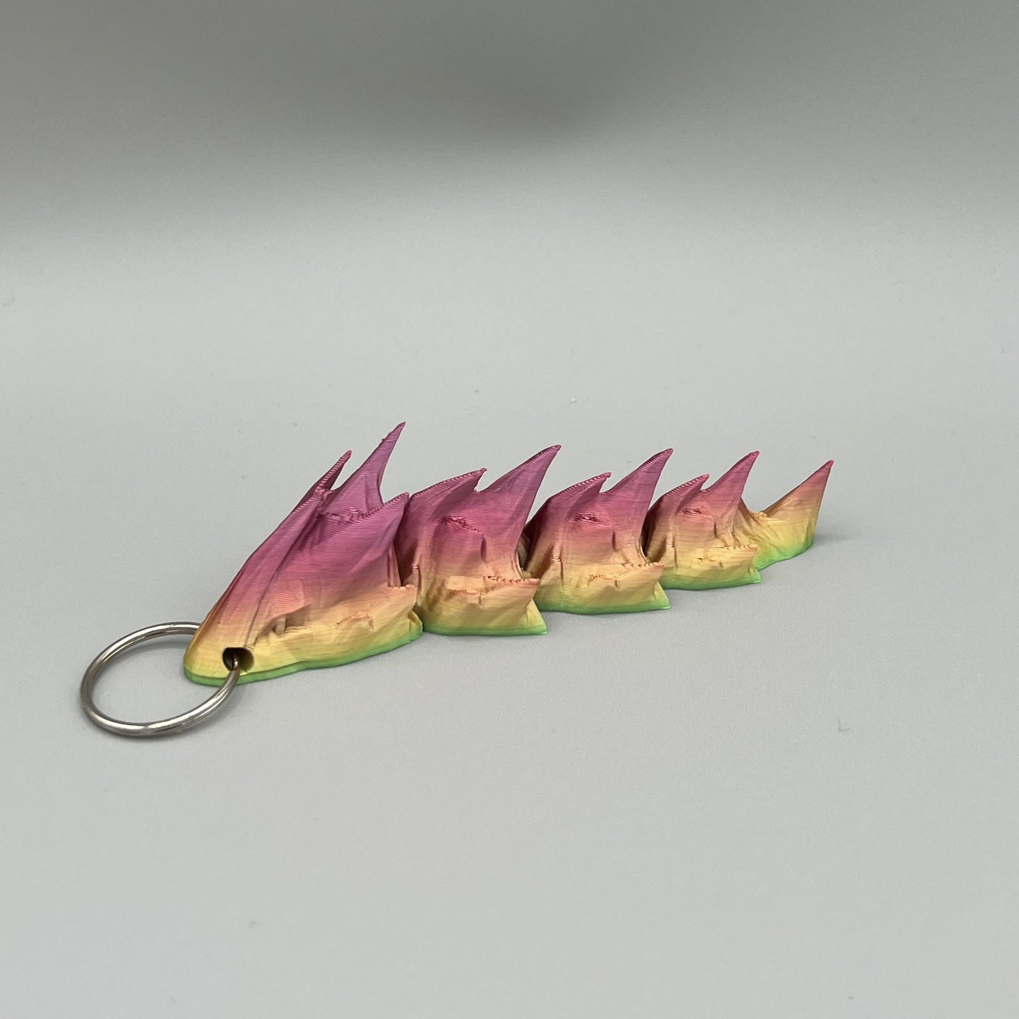 Heady Prints 3D printed multicolor articulated sea serpent, close up