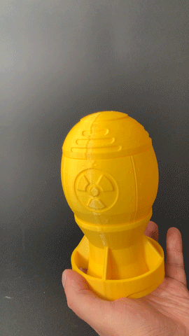 Heady Prints 3D printed yellow atomic bomb secret box, animated