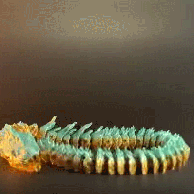 Heady Prints 3D printed teal and orange Boitata articulated snake figurine, animated view