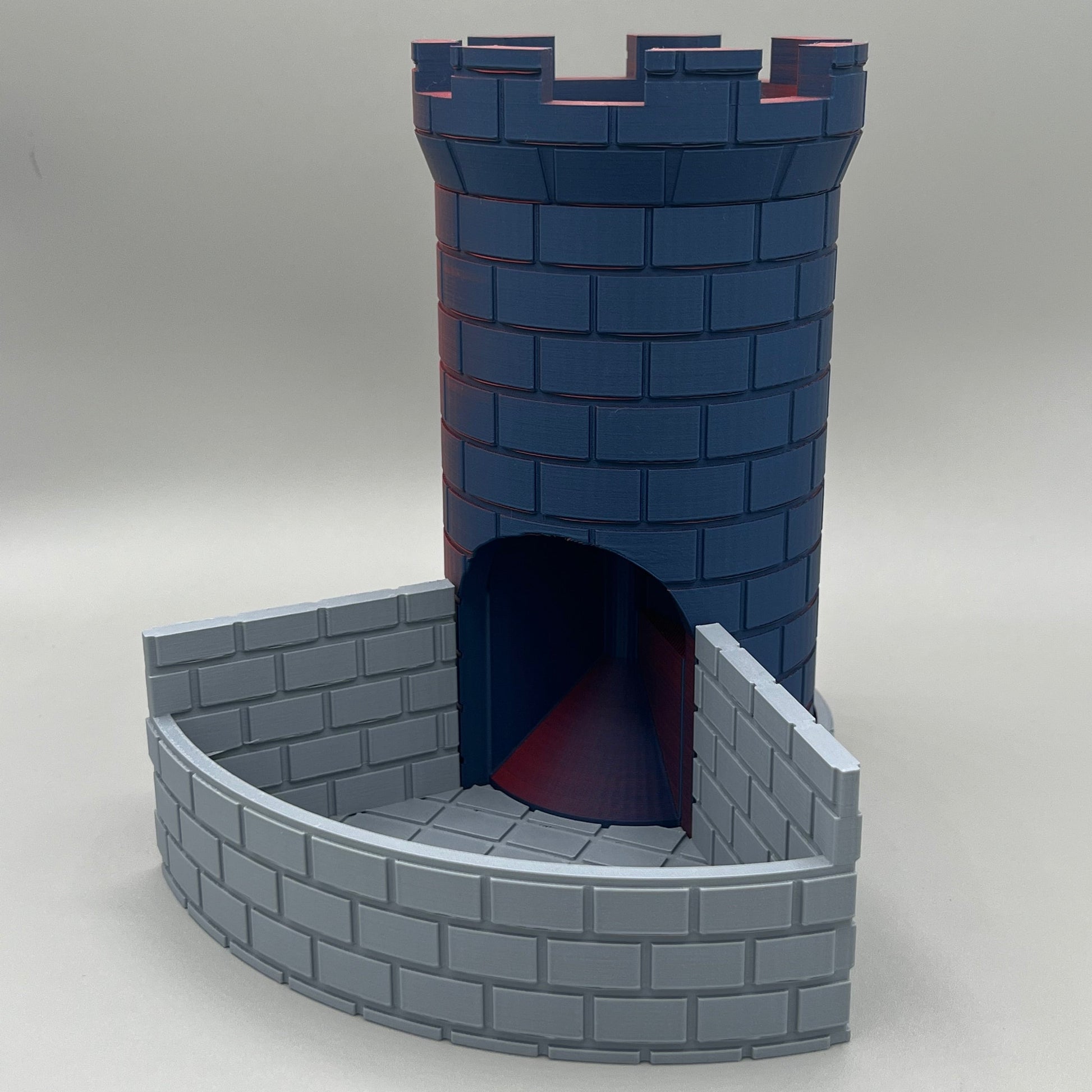 Heady Prints 3D printed blue and grey castle dice tower, three quarter view