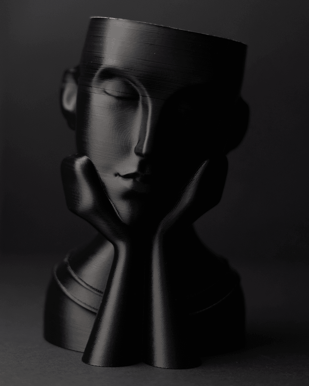 Heady Prints 3D printed black face vase, side view