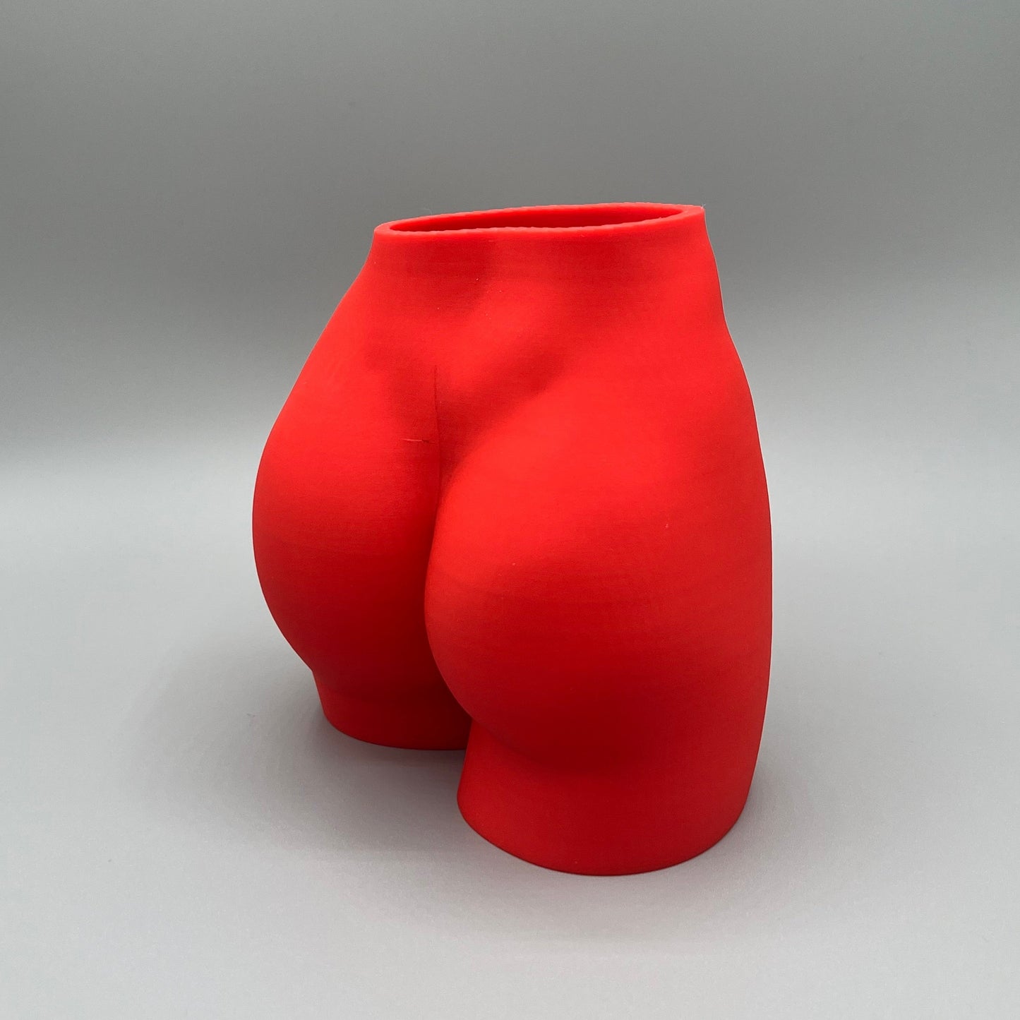 Heady Prints 3D printed red female body vase, front view