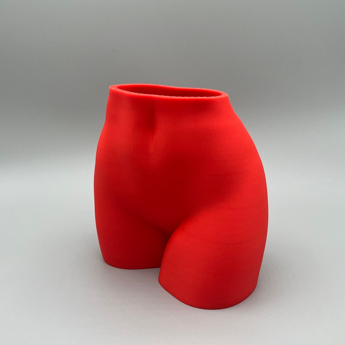 Heady Prints 3D printed red female body vase, three quarter view