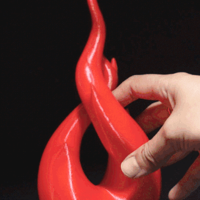 Heady Prints 3D printed orange and red flame sculpture, animated product view