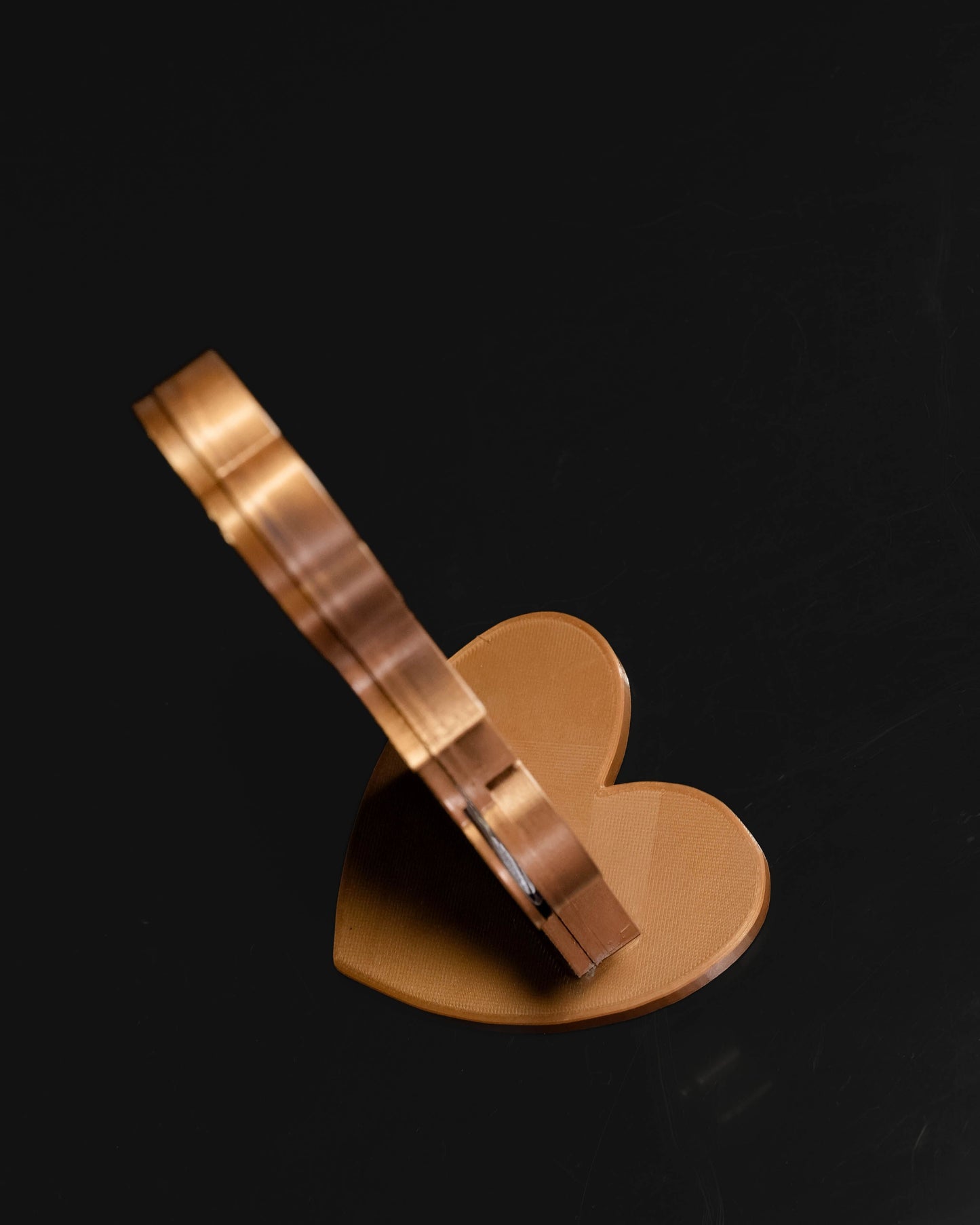 Heady Prints 3D printed gold Future Mama ultrasound holder, side view