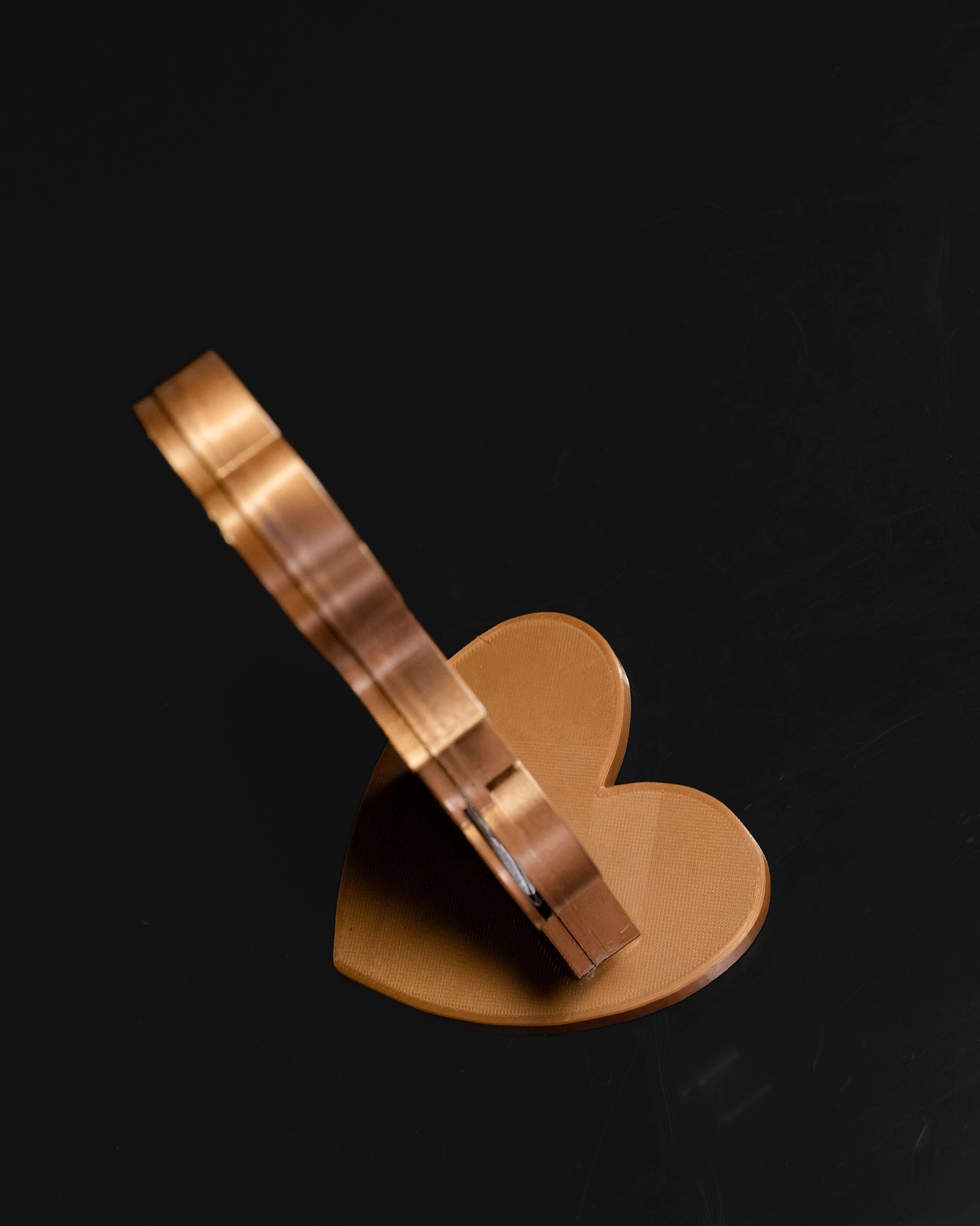Heady Prints 3D printed gold Future Mama ultrasound holder, side view