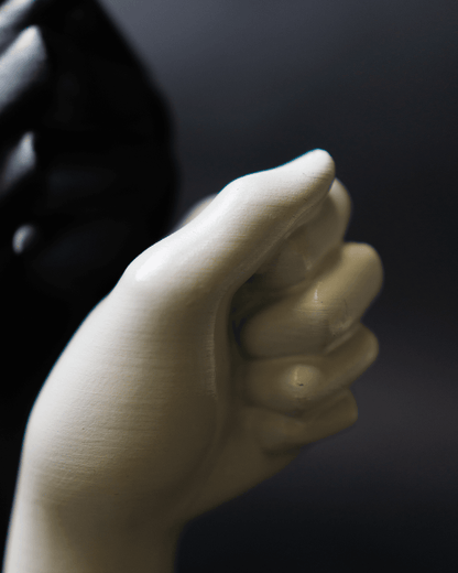Heady Prints 3D printed white hand-shaped flower vase held in hand, scale reference
