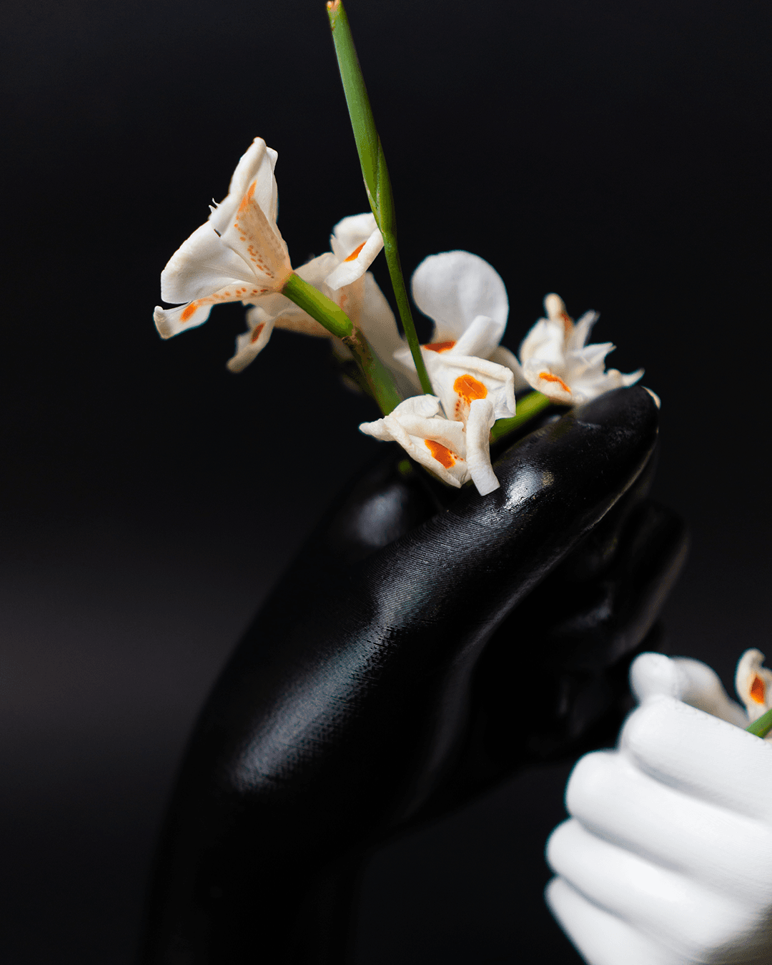 Heady Prints 3D printed white hand-shaped flower vase with flowers, outdoor lifestyle