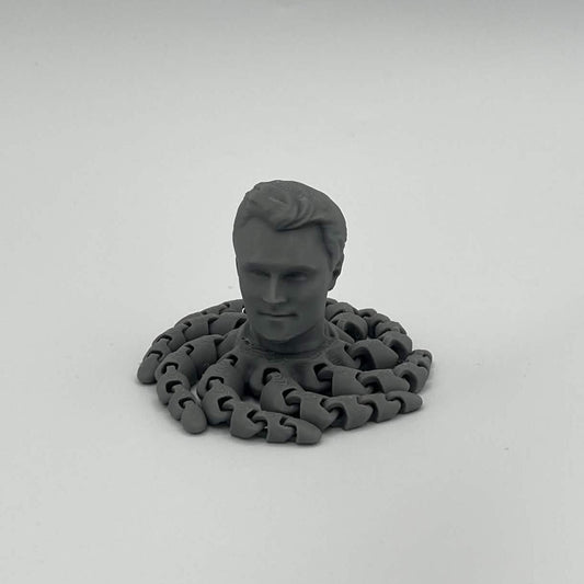 Heady Prints 3D printed gray Kirktopus articulated octopus figure, front view