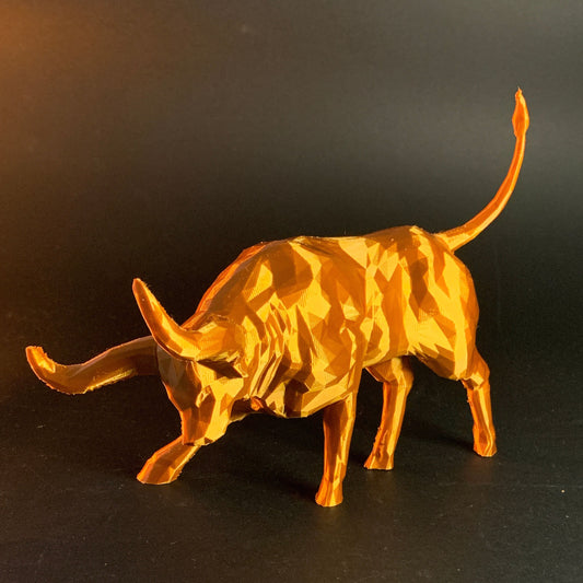 Heady Prints 3D printed low poly golden bull figurine, lifestyle shot