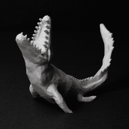Heady Prints 3D printed low poly raptor figurine, angled view