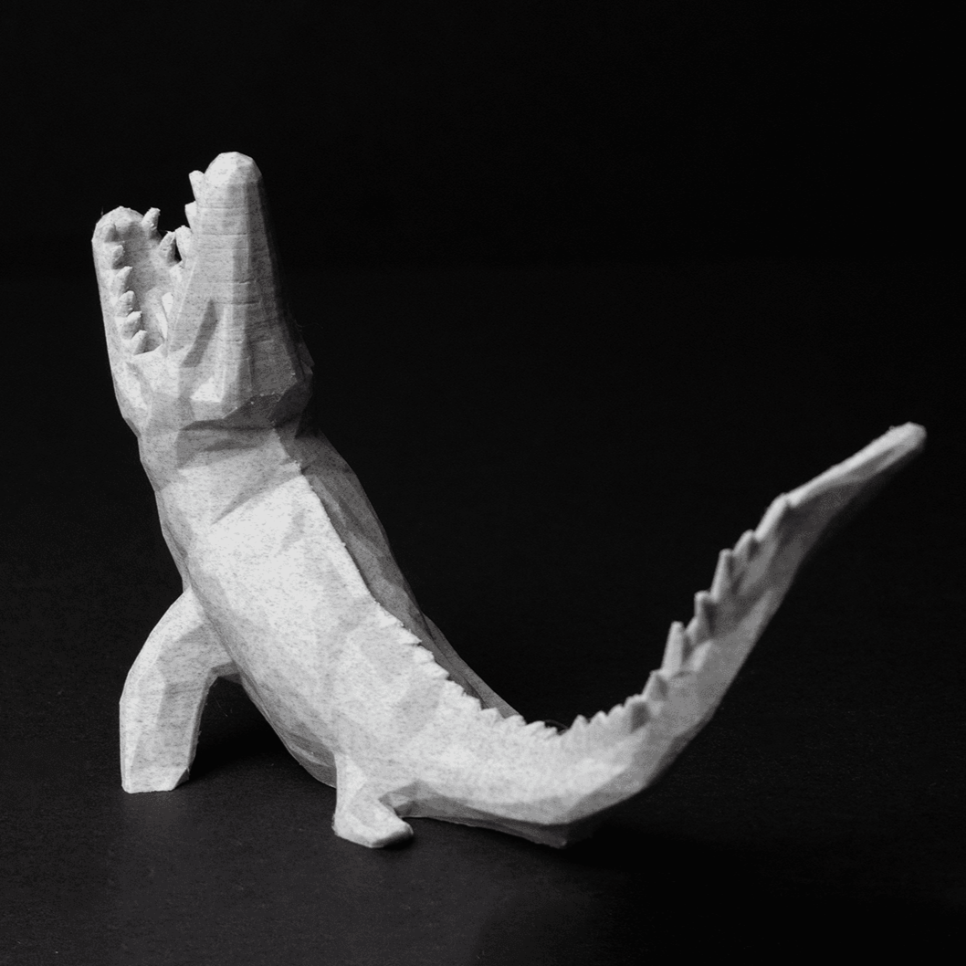 Heady Prints 3D printed low poly raptor figurine, desk companion collectible