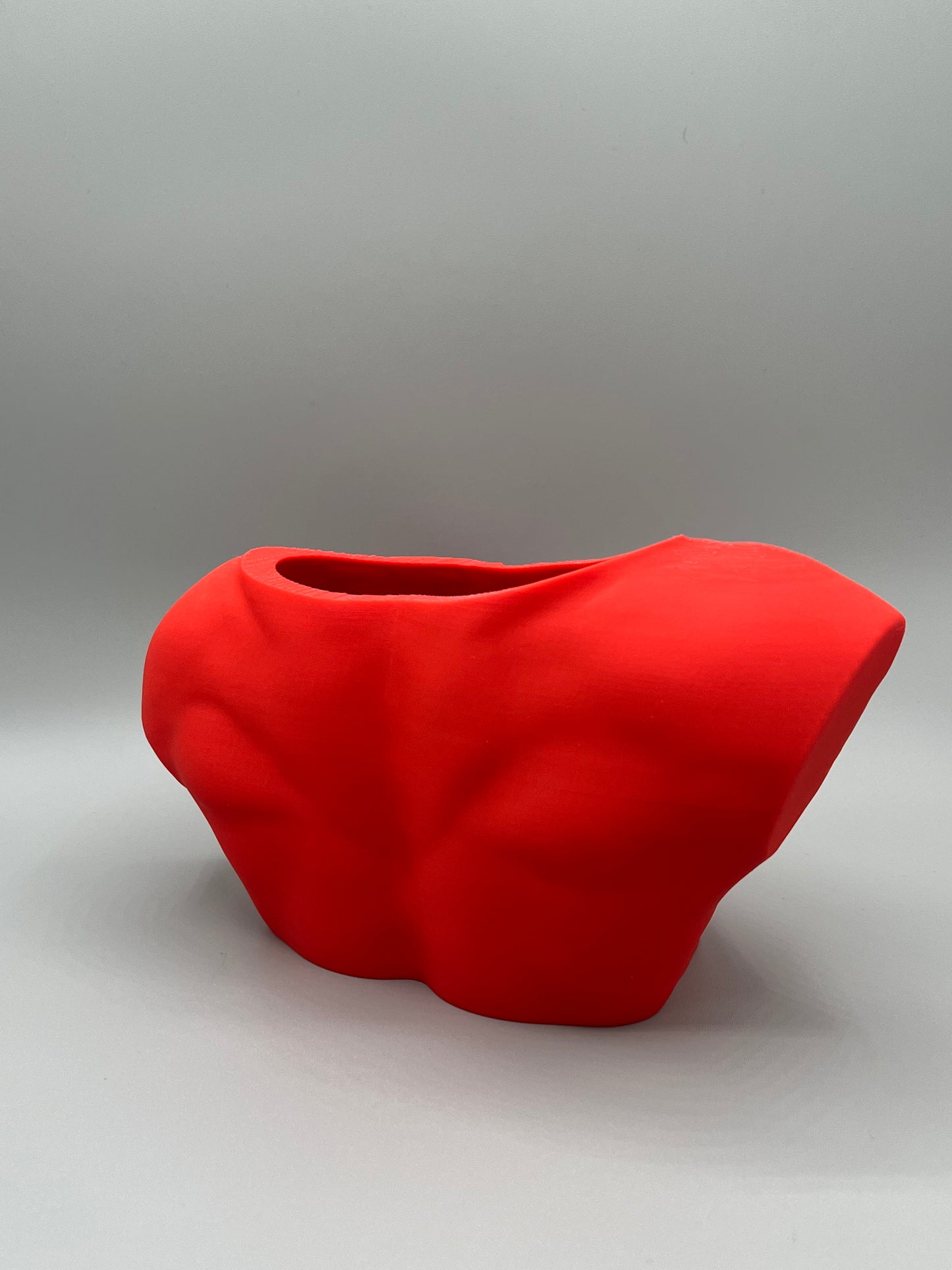 Heady Prints 3D printed red male torso vase, side view