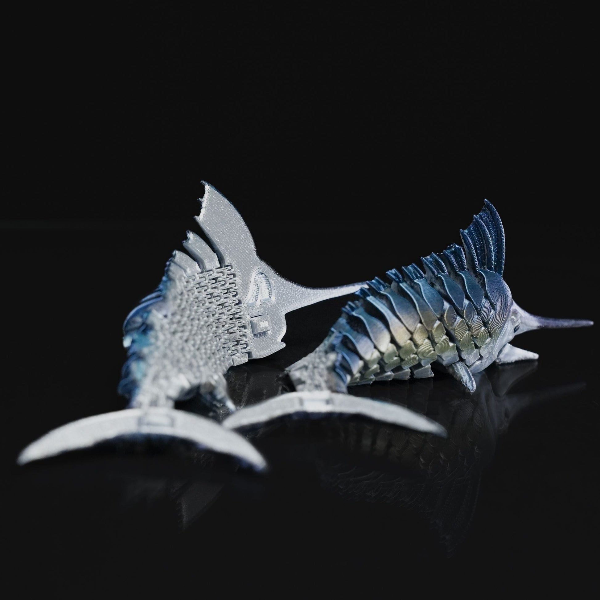 Heady Prints 3D printed blue and silver marlin fish figurine, angled view