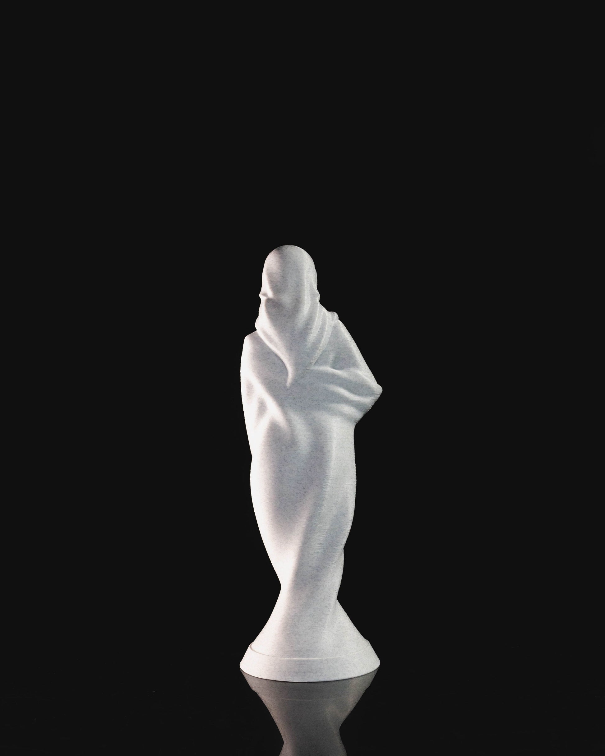 Heady Prints 3D printed white mother and child statue, three-quarter view