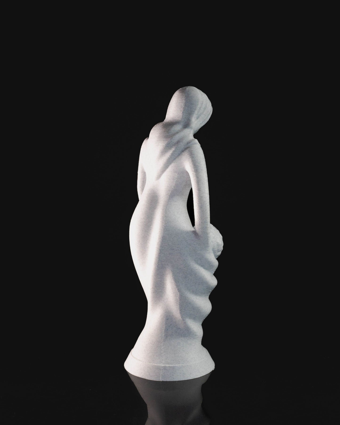 Heady Prints 3D printed white mother and infant statue, angled view