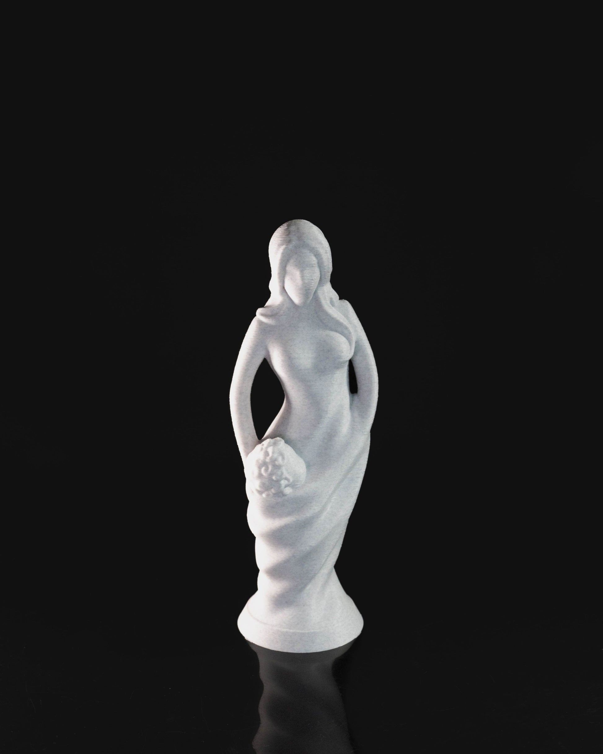 Heady Prints 3D printed white mother and infant statue, three-quarter view