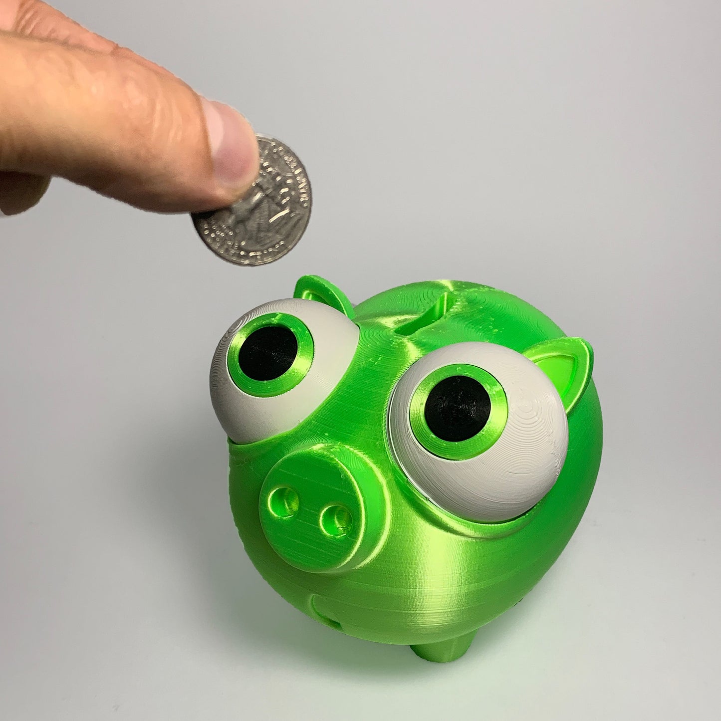 Heady Prints 3D printed green Piggy Pork Bank lifestyle shot, novelty coin bank