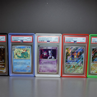 Heady Prints 3D printed PSA slab guards displaying collection of graded trading cards