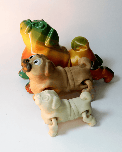 Heady Prints 3D printed tan pug figurine, small to big, view