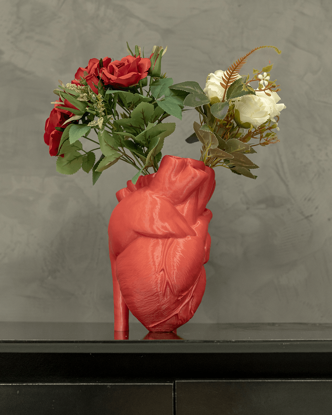 Heady Prints 3D printed red realist heart vase with flowers, angled view