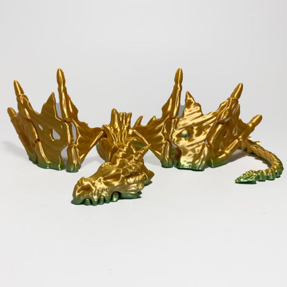 Heady Prints 3D printed gold stegosaurus figurines group shot, desk companion collectibles
